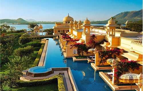 A view of the hotel pool and grounds, booked through Khyber Travel & Tourism.